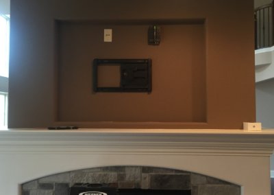 Kitchen TV over fireplace mount